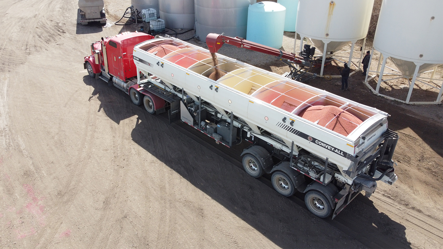 Convey-All Seed Tender being loaded with seed